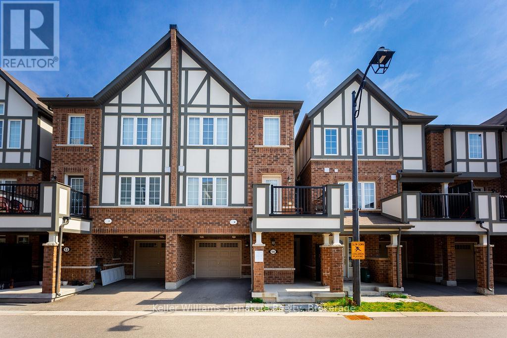 14 - 1222 Rose Way, Milton, Ontario  L9E 1P2 - Photo 1 - W12160994