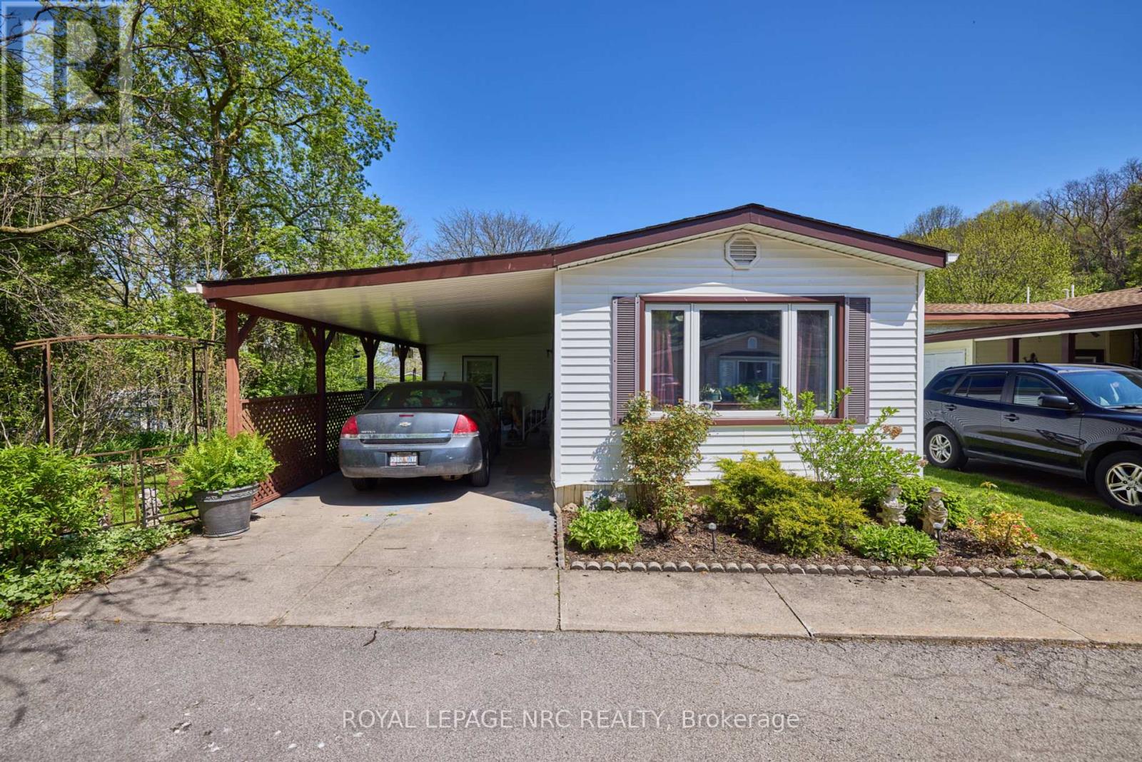 240 - 23 Four Mile Creek Road, Niagara-On-The-Lake, Ontario  L0S 1J1 - Photo 1 - X12160973