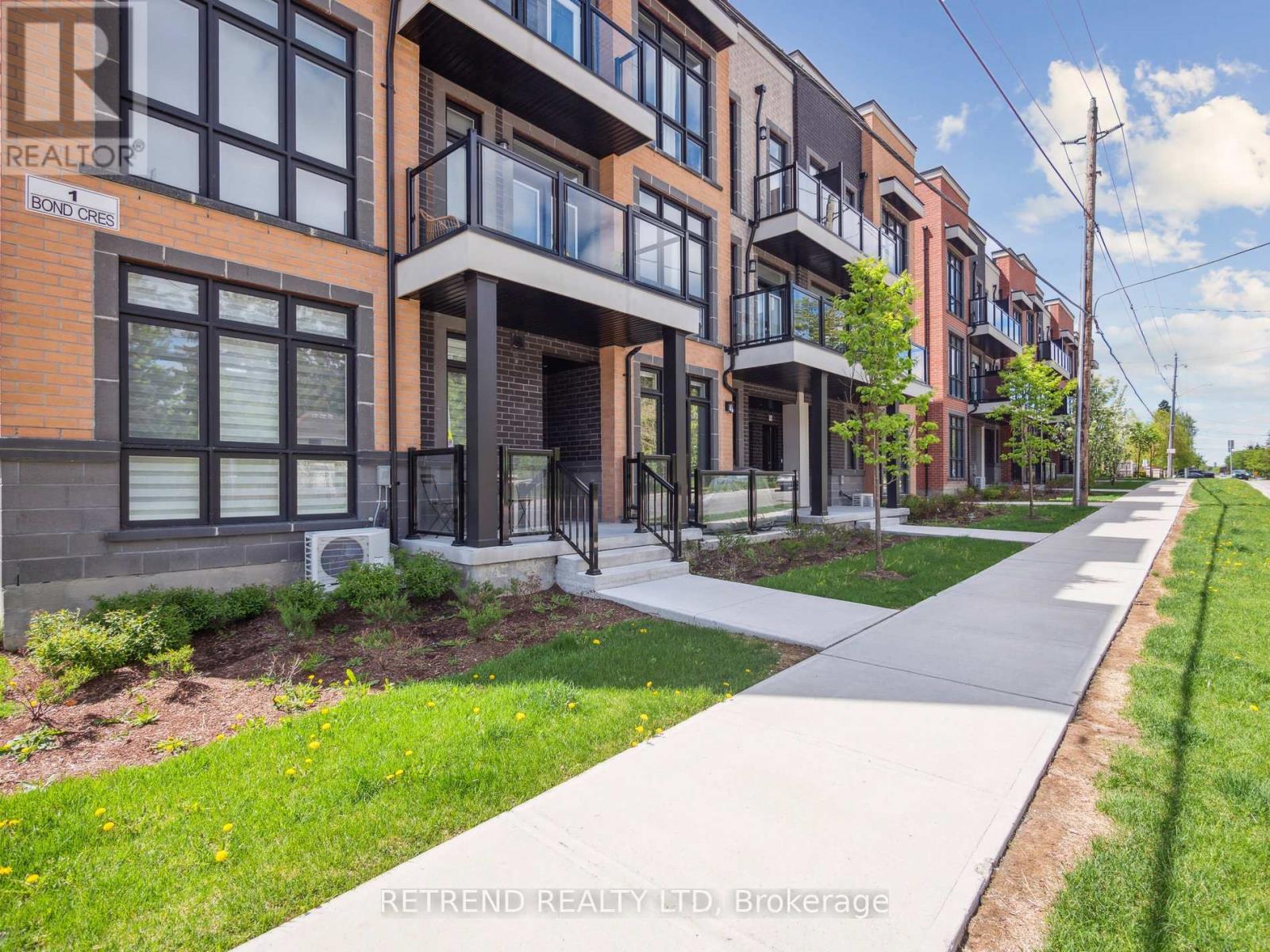 9 - 1 Bond Crescent, Richmond Hill, Ontario  L4E 1J4 - Photo 2 - N12161119