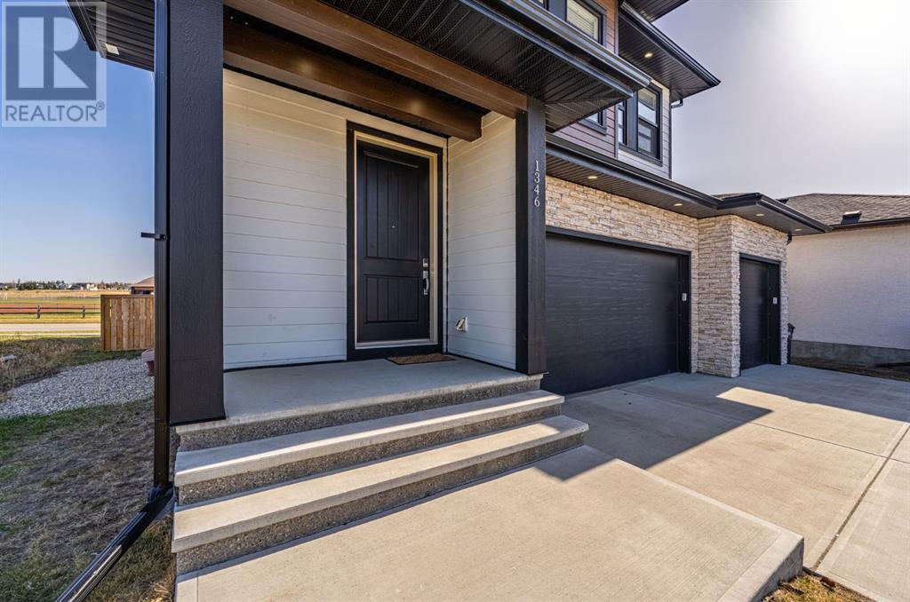 1346 Lackner Boulevard, Carstairs, Alberta  T0L 0N0 - Photo 3 - A2216307