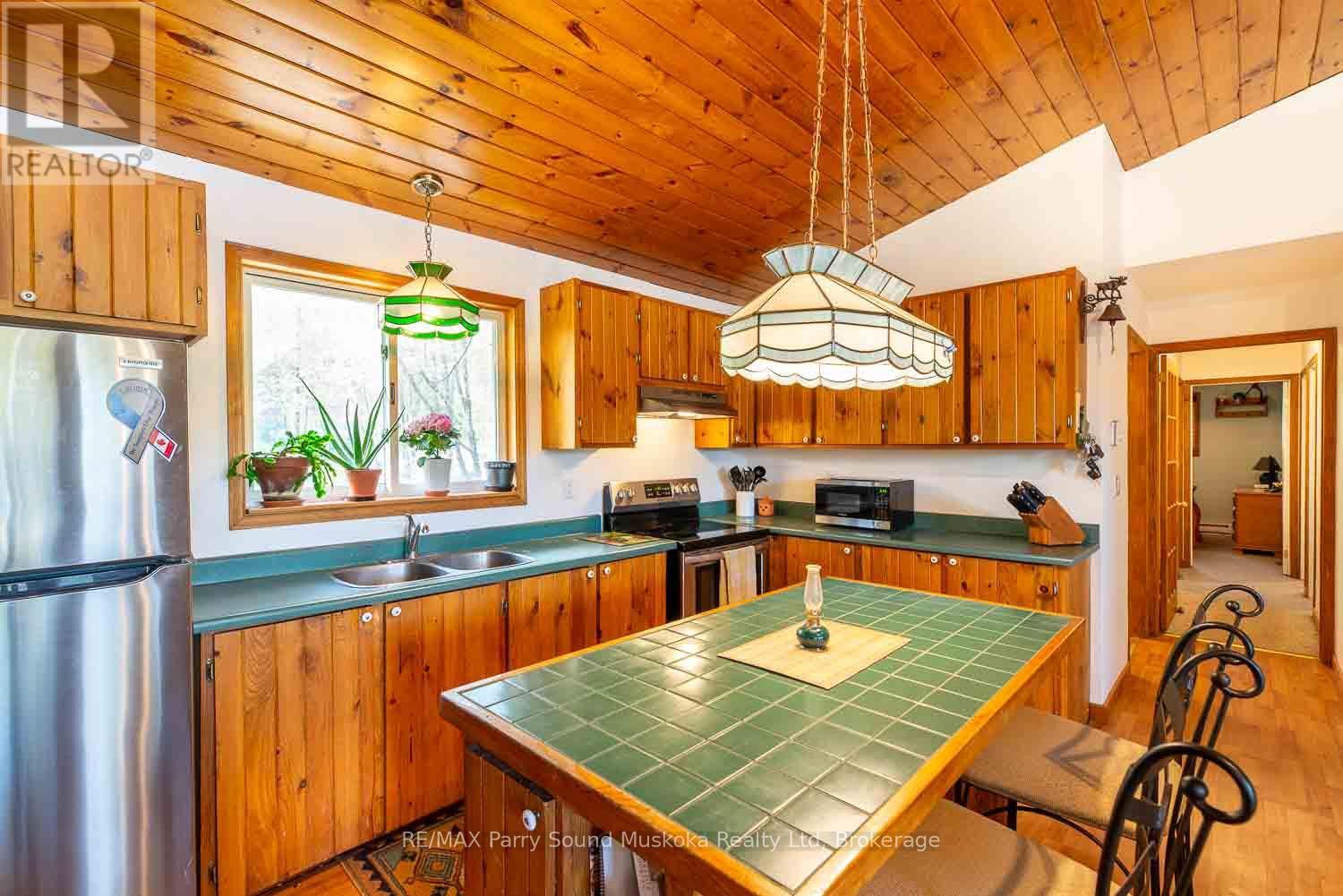 1931 B South Horn Lake Road, Magnetawan, Ontario  P0A 1C0 - Photo 6 - X12161265