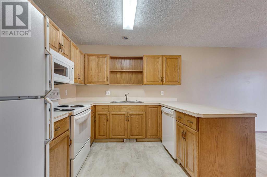 8, 5711 50 Avenue, Stettler, Alberta  T0C 2L2 - Photo 10 - A2207122