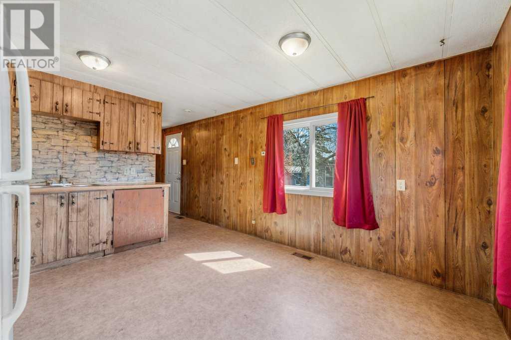 115 Huntwell Court Ne, Calgary, Alberta  T2K 5V1 - Photo 5 - A2220269