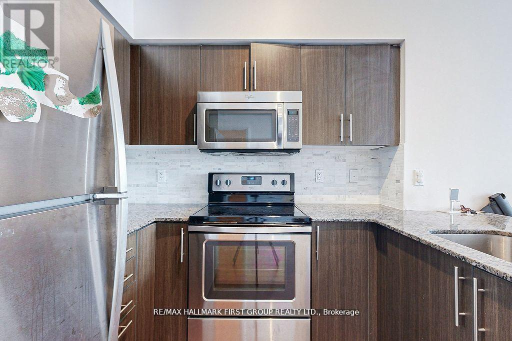 Ph06 - 65 Speers Road, Oakville, Ontario  L6K 0J1 - Photo 4 - W12162929