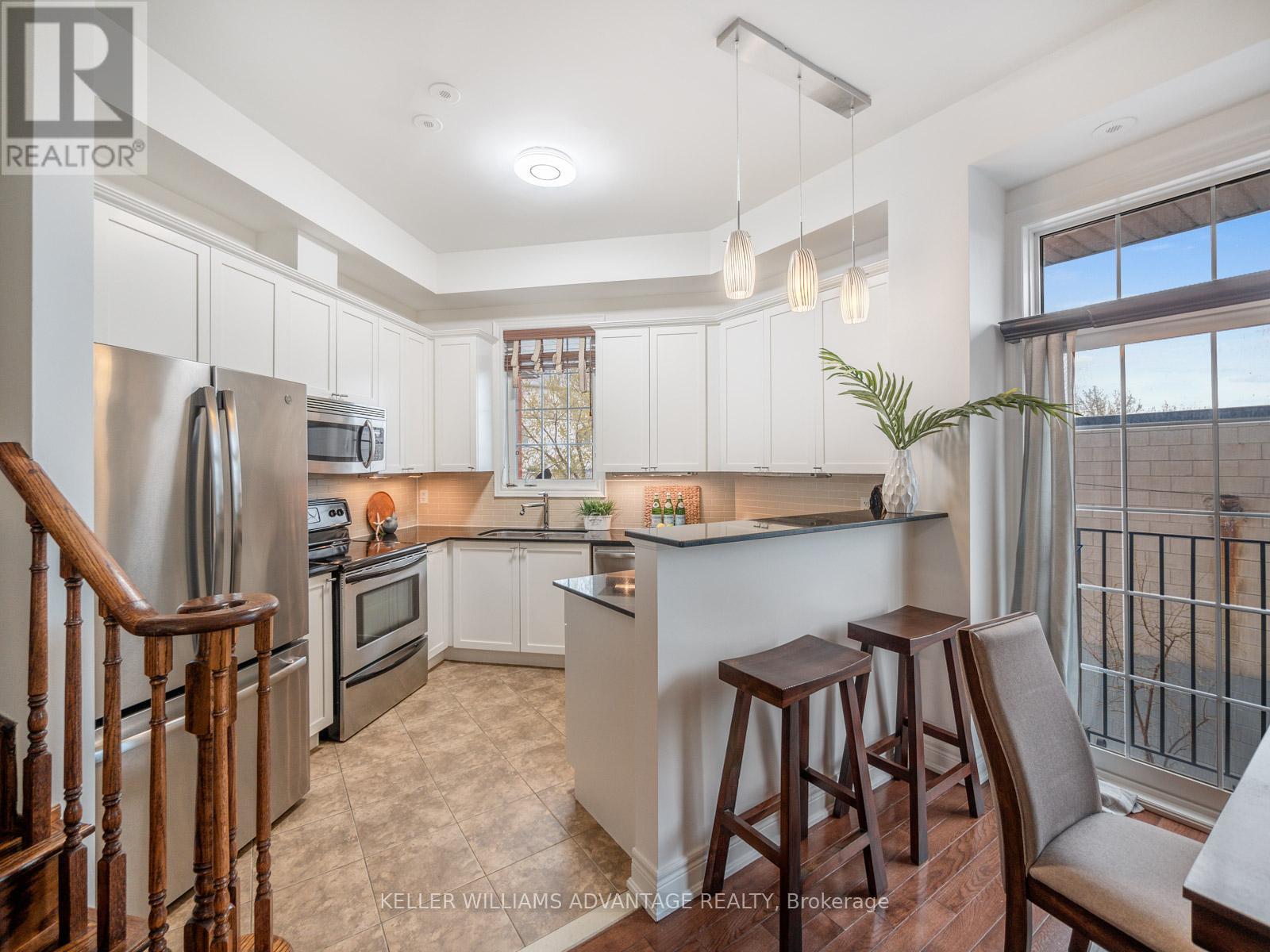 34 Fairhead Mews, Toronto, Ontario  M4E 3Y4 - Photo 6 - E12163348