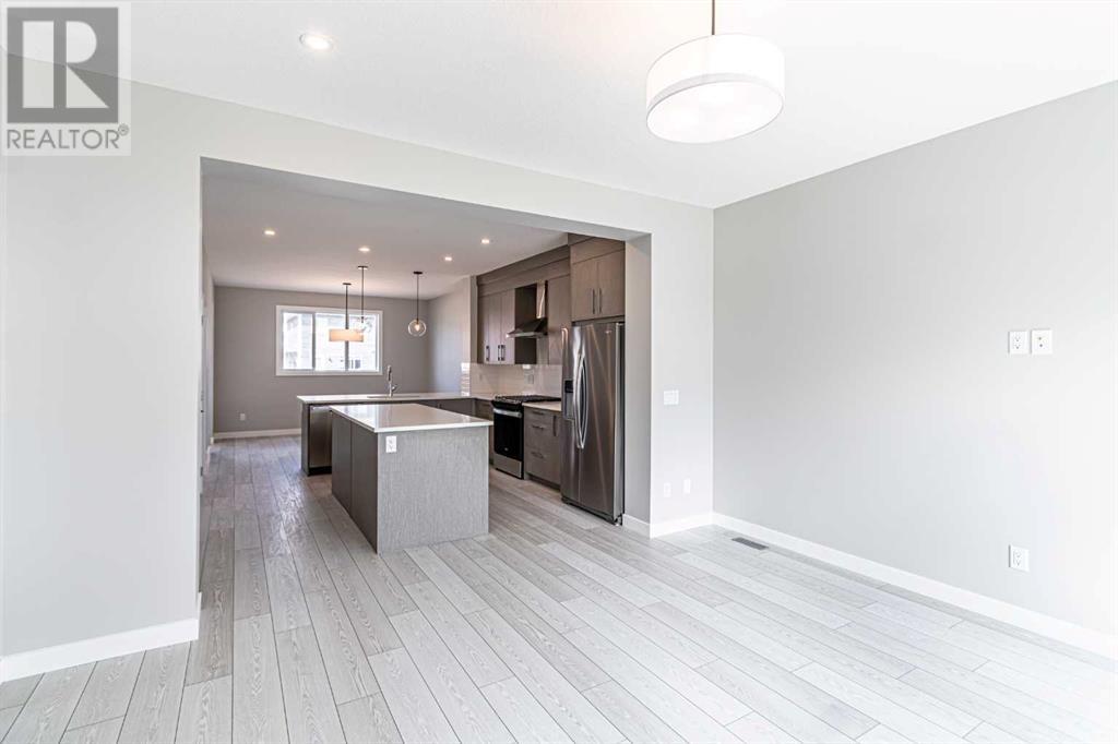 121 Dawson Wharf View, Chestermere, Alberta  T0T 0T0 - Photo 4 - A2221348