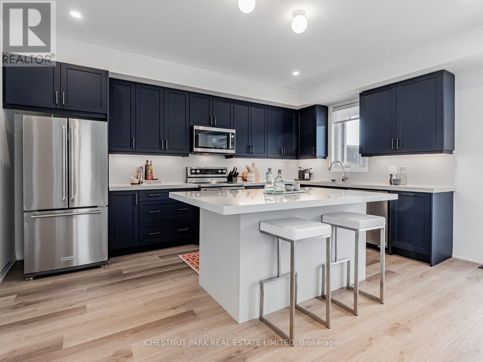 50 Robert Eaton Avenue, Markham, Ontario  M4J 2Z5 - Photo 4 - N12163585