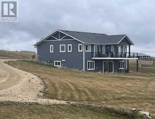 137 Bruhn Boulevard, Rural Ponoka County, Alberta  T0C 2J0 - Photo 2 - A2195736