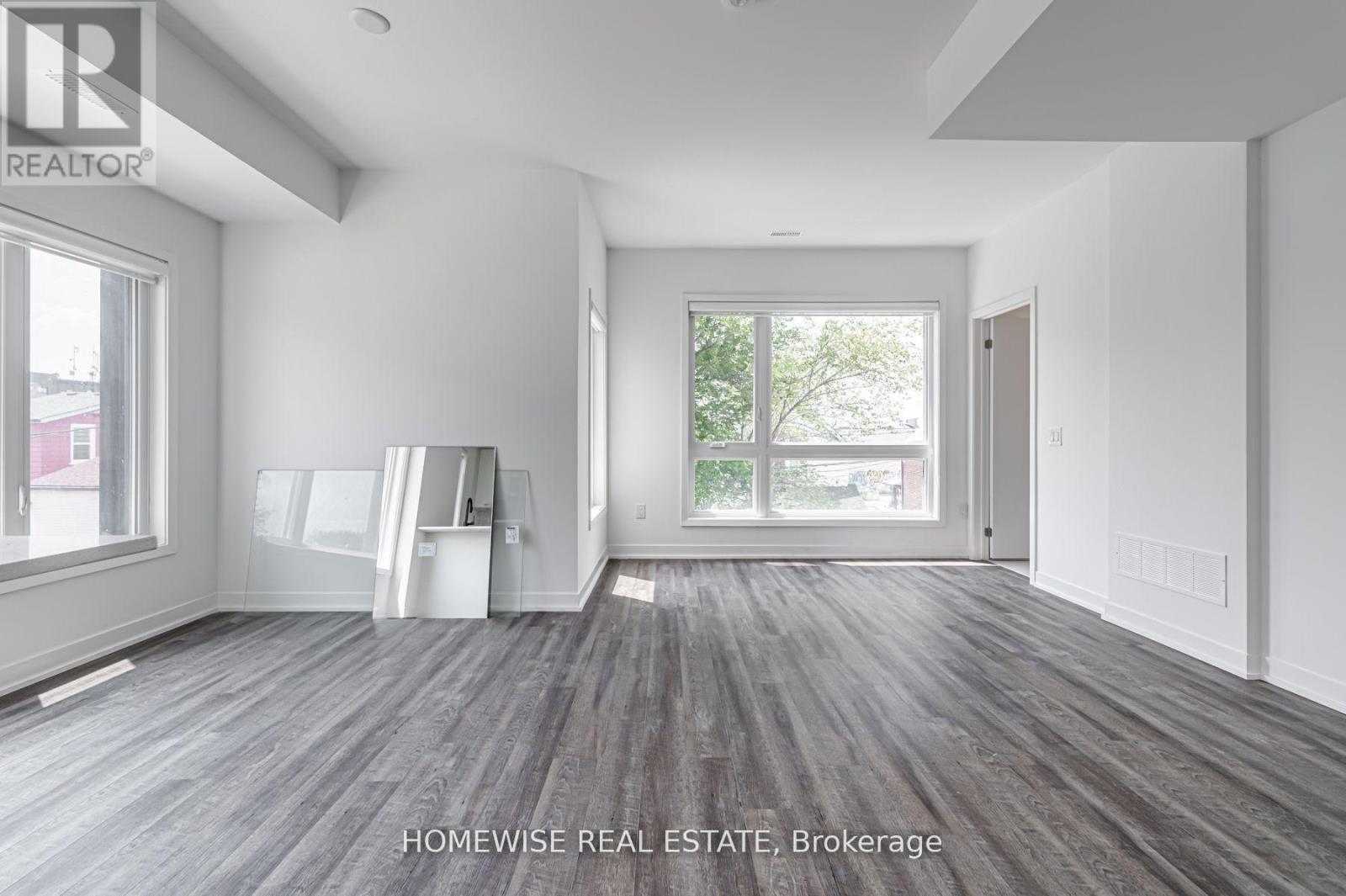 Th7 - 30 Ed Clark Gardens Boulevard, Toronto (Weston-Pellam Park), Ontario  M6N 0B5 - Photo 4 - W12163988