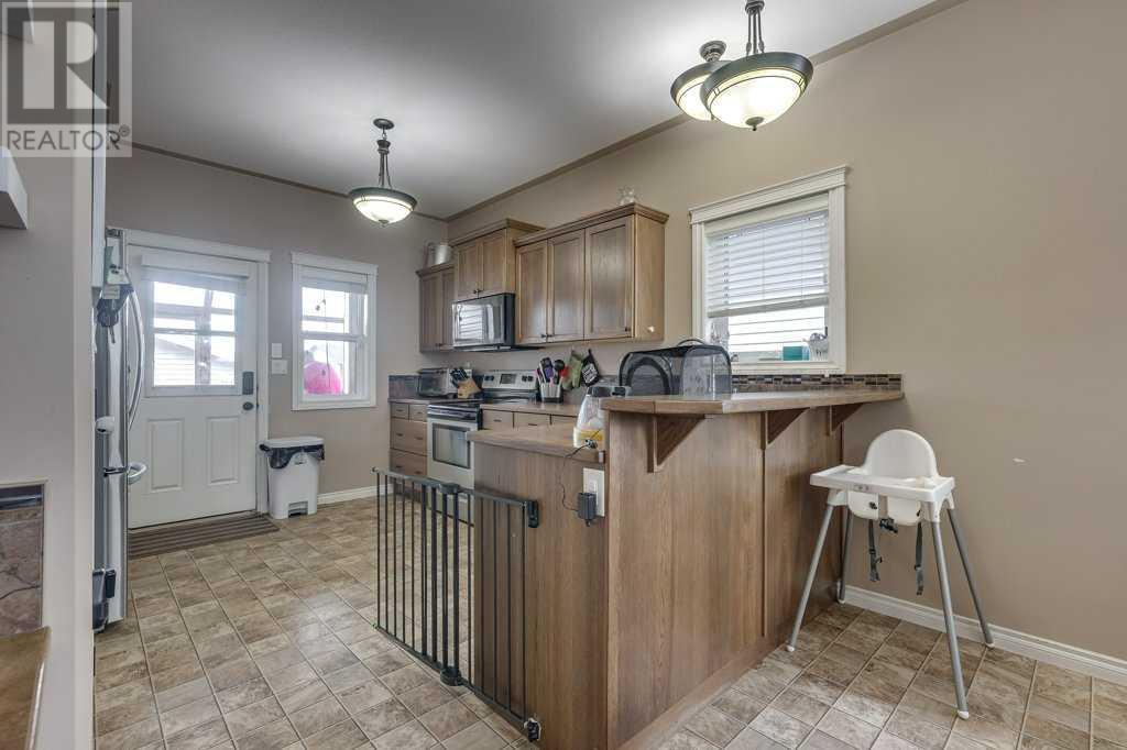 82 Harvest Close, Penhold, Alberta  T0M 1R0 - Photo 10 - A2221060