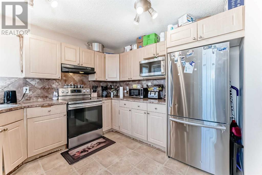 79 Saddlebrook Common Ne, Calgary, Alberta  T3J 0J6 - Photo 9 - A2219362