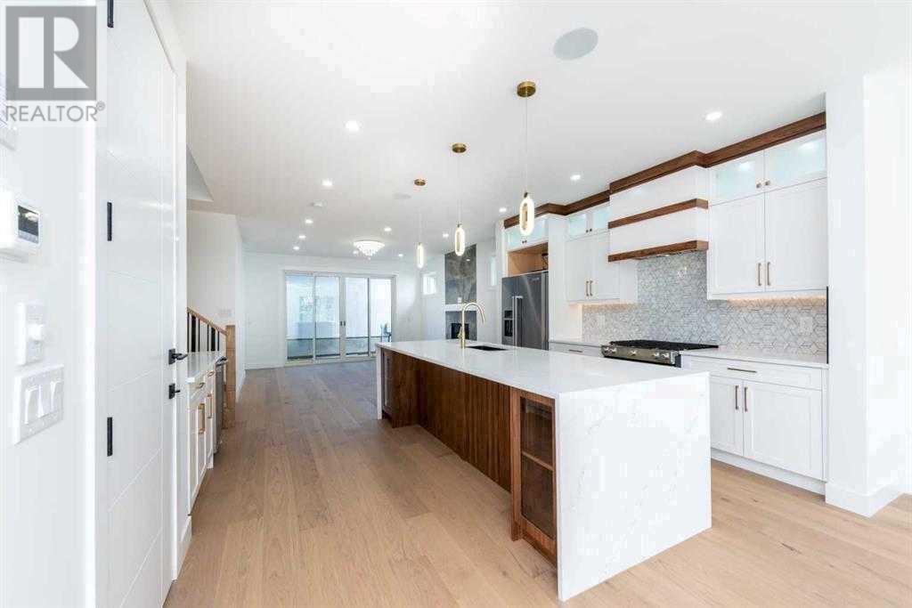 105 Hartford Road Nw, Calgary, Alberta  T2K 2A7 - Photo 3 - A2211962