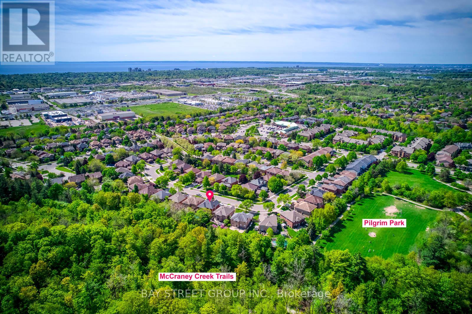 1311 Blackburn Drive, Oakville, Ontario  L6M 2N5 - Photo 4 - W12161449