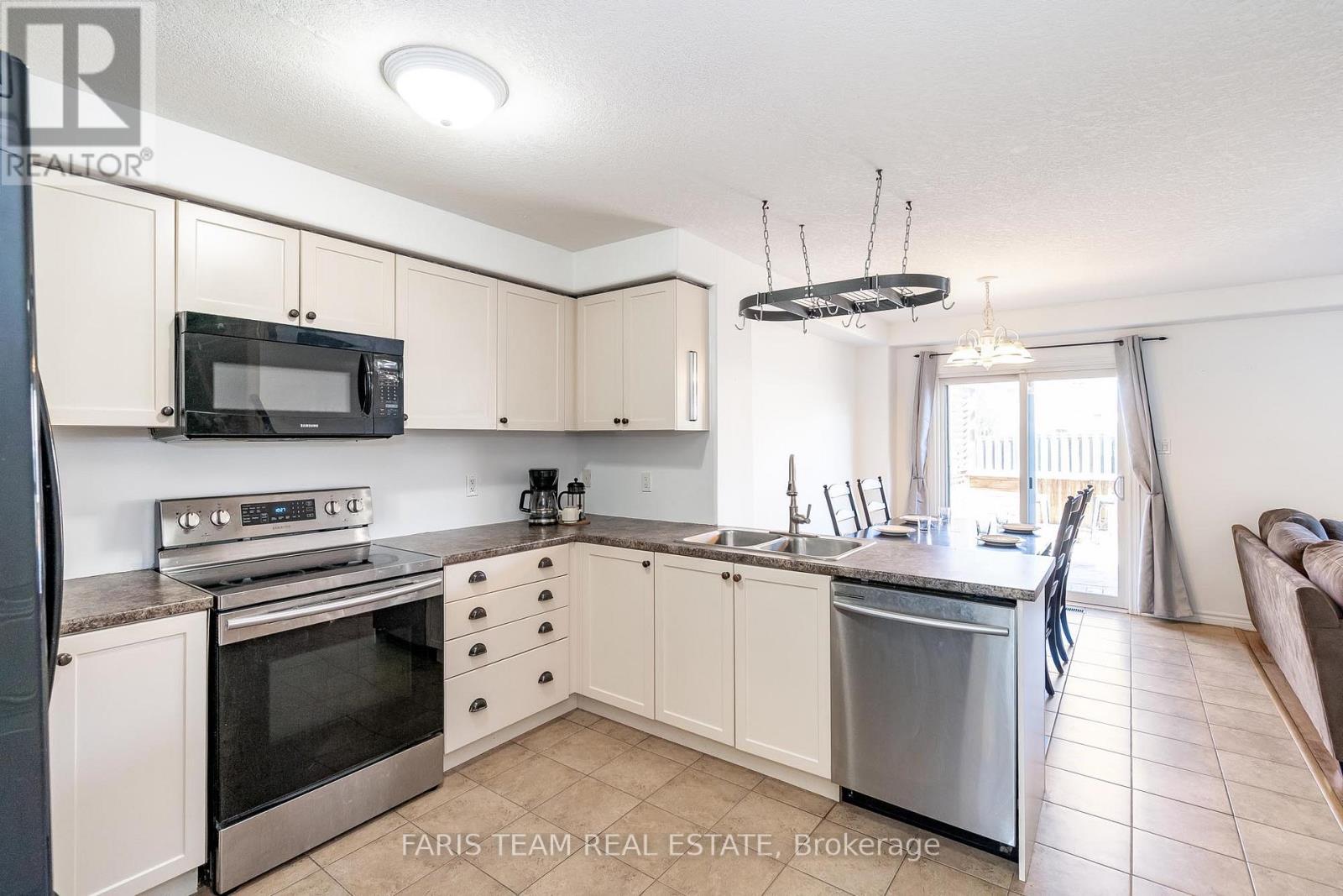 108 Quigley Street, Essa, Ontario  L0M 1B6 - Photo 4 - N12164624