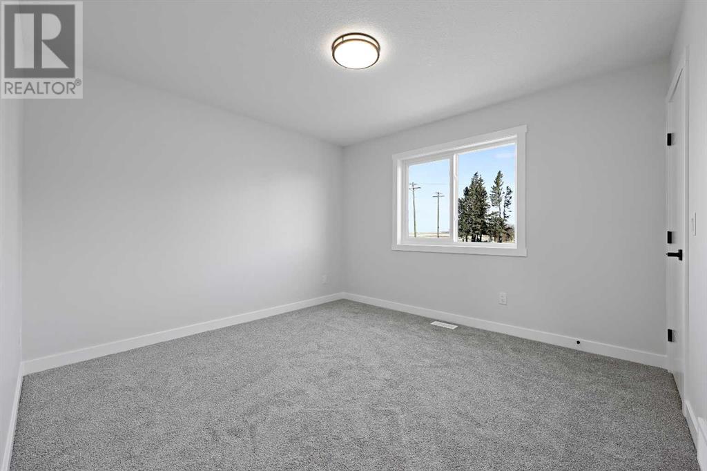 604 Clover Road, Carstairs, Alberta  T0M 0N0 - Photo 18 - A2212547