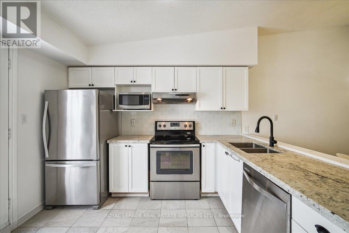 407 - 1440 Bishops Gate, Oakville (Ga Glen Abbey), Ontario  L6M 4M9 - Photo 9 - W12166108