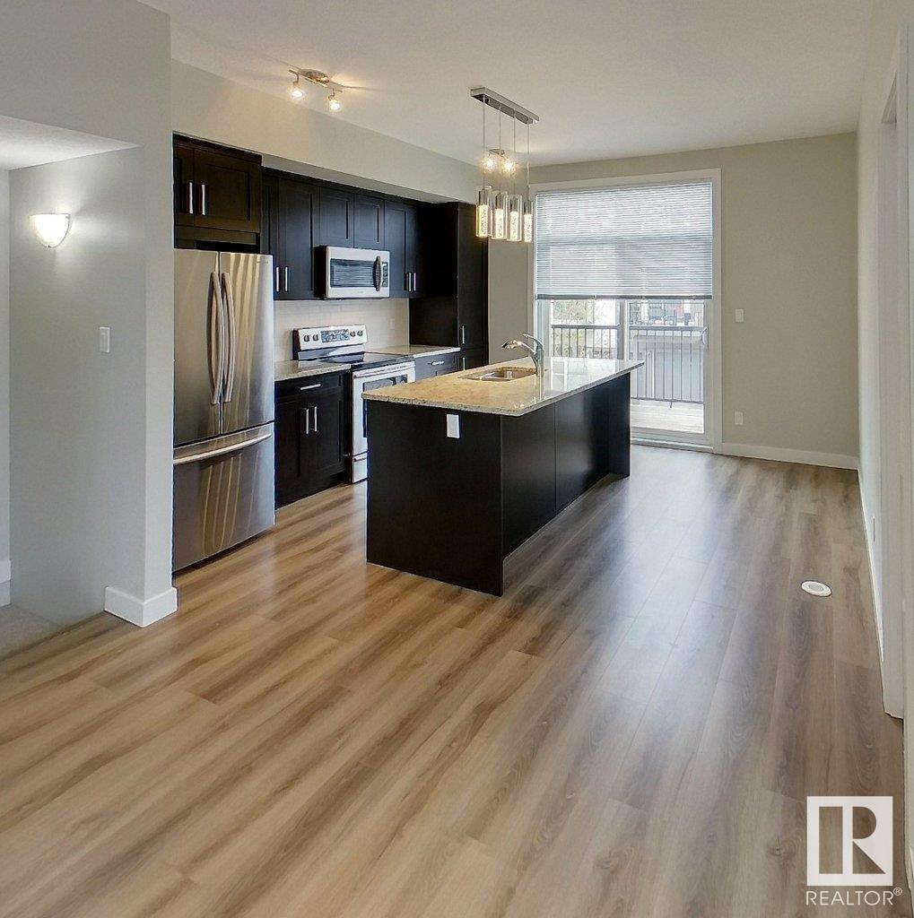 Property at #102 2560 PEGASUS BV NW image 5
