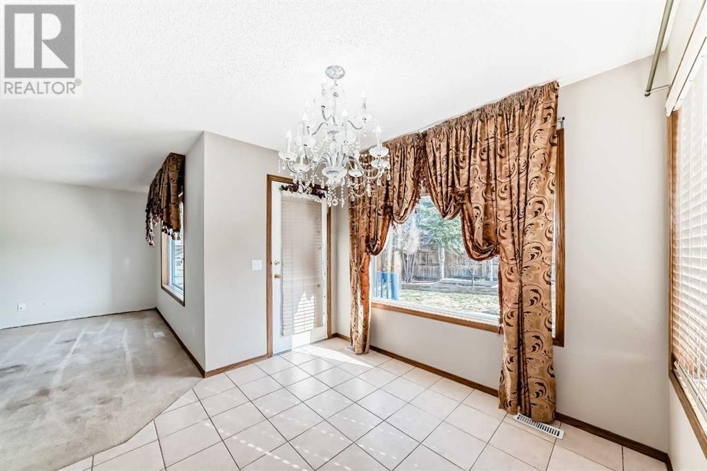 198 Rocky Ridge Close Nw, Calgary, Alberta  T3G 4X2 - Photo 7 - A2214007