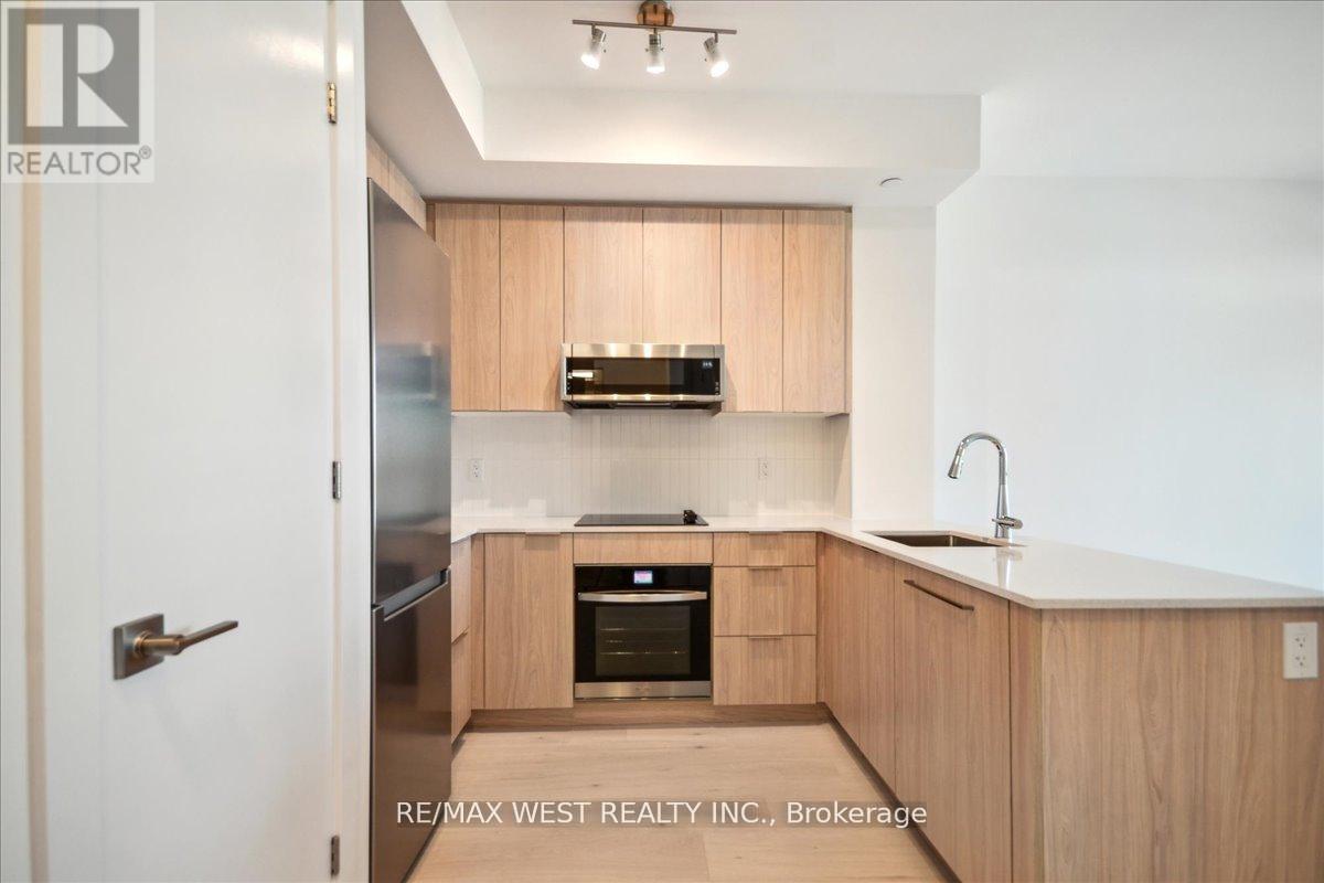 553 - 2501 Saw Whet Boulevard, Oakville, Ontario  L6M 5N2 - Photo 2 - W12166929