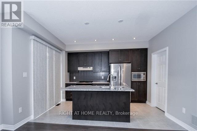 6 - 3026 Postridge Drive, Oakville (Jm Joshua Meadows), Ontario  L6H 7E3 - Photo 4 - W12167262