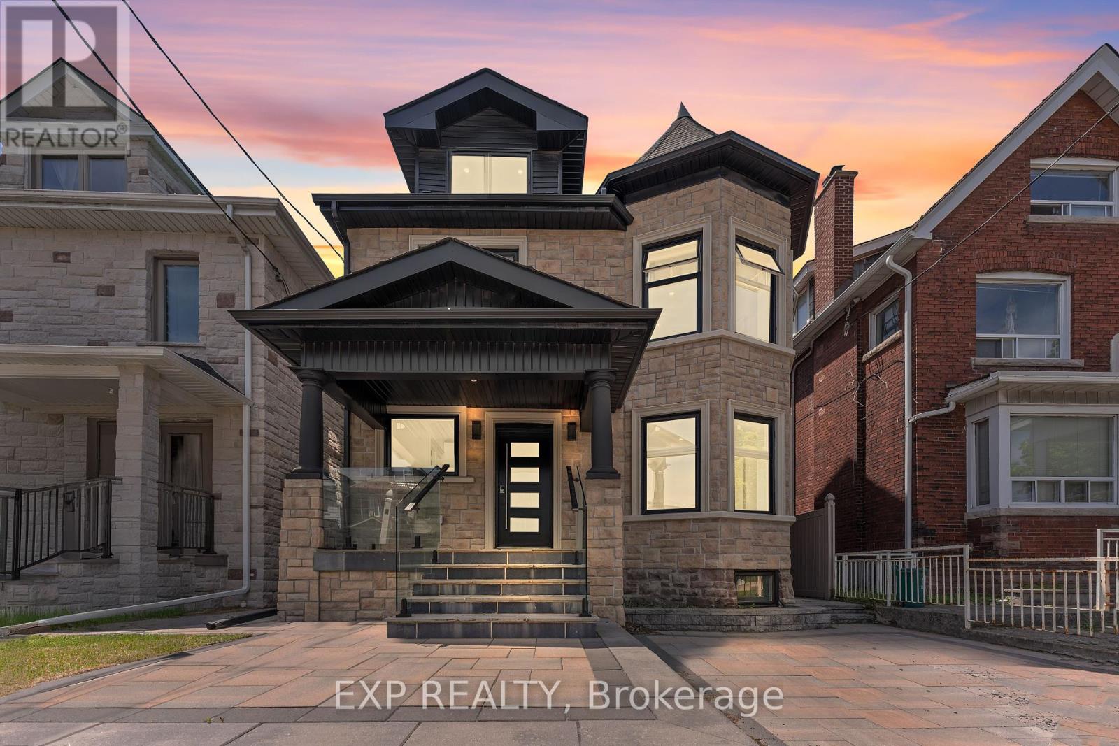 <div class="slider-price">$1,945,000</div><p>298 Keele Street, Toronto, Ontario</p>