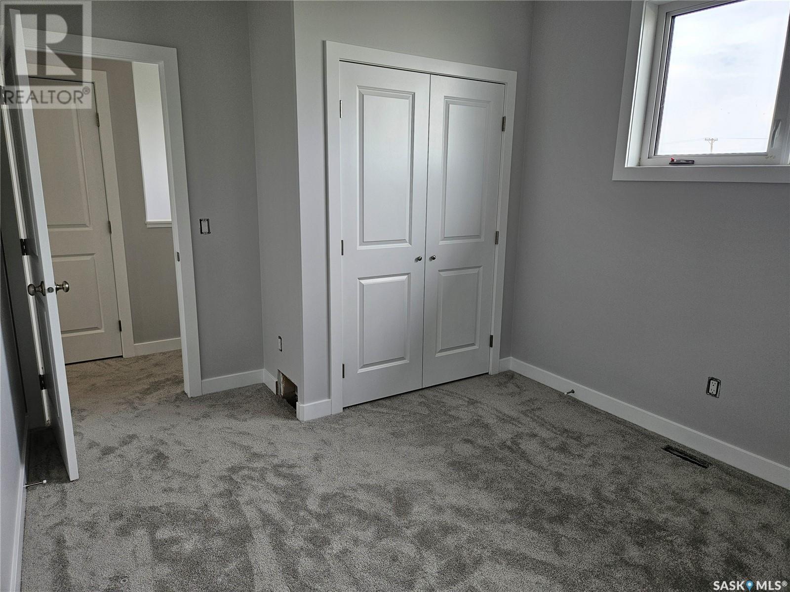 848 Delaet Bay, Warman, Saskatchewan  S0K 0A1 - Photo 21 - SK006856