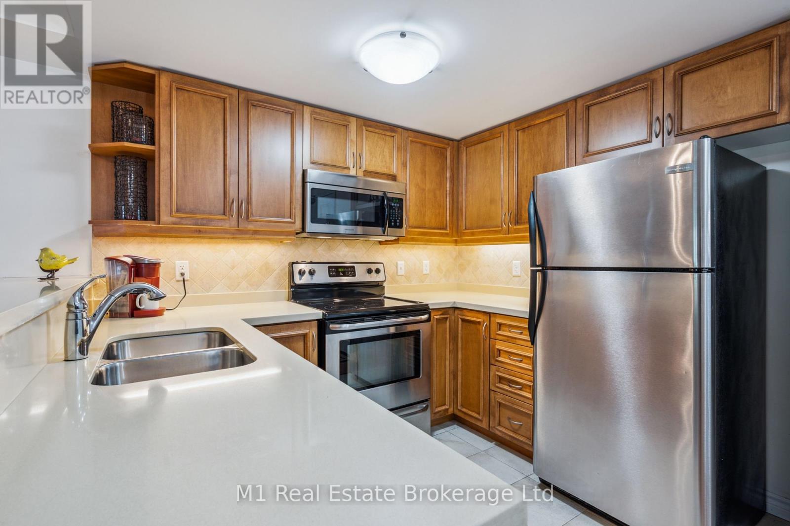 105 - 19 Waterford Drive, Guelph, Ontario  N1L 0G8 - Photo 12 - X12168033