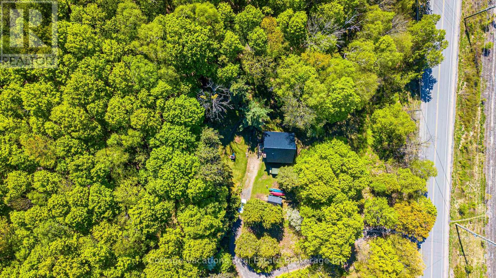 527 Aspdin Road, Huntsville, Ontario  P1H 1Y4 - Photo 7 - X12161627