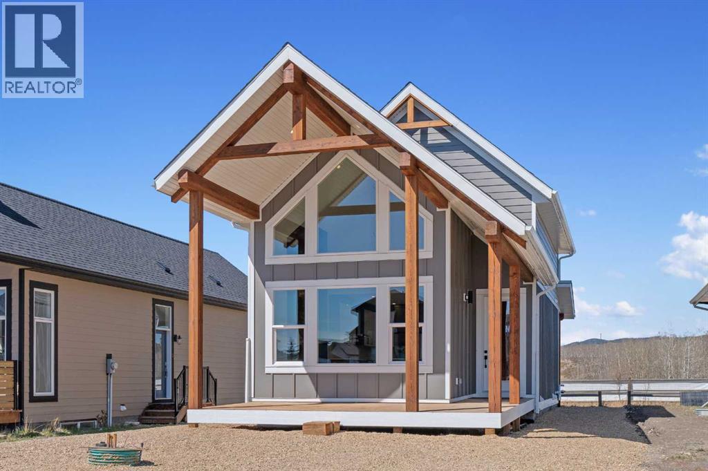 38 Cottageclub Lane, Rural Rocky View County, Alberta  T4C 1B1 - Photo 6 - A2221305