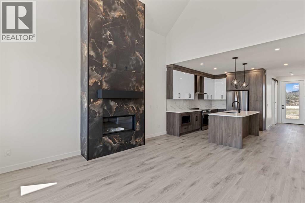 38 Cottageclub Lane, Rural Rocky View County, Alberta  T4C 1B1 - Photo 9 - A2221305