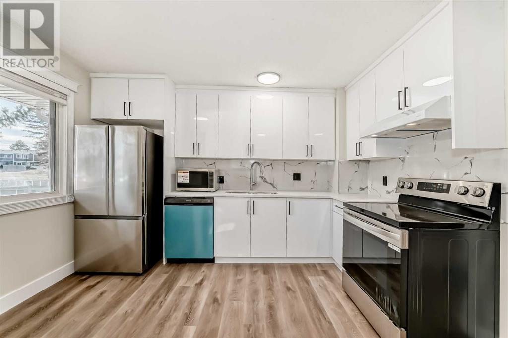 312 Georgian Villas Ne, Calgary, Alberta  T2A 7E2 - Photo 4 - A2204476