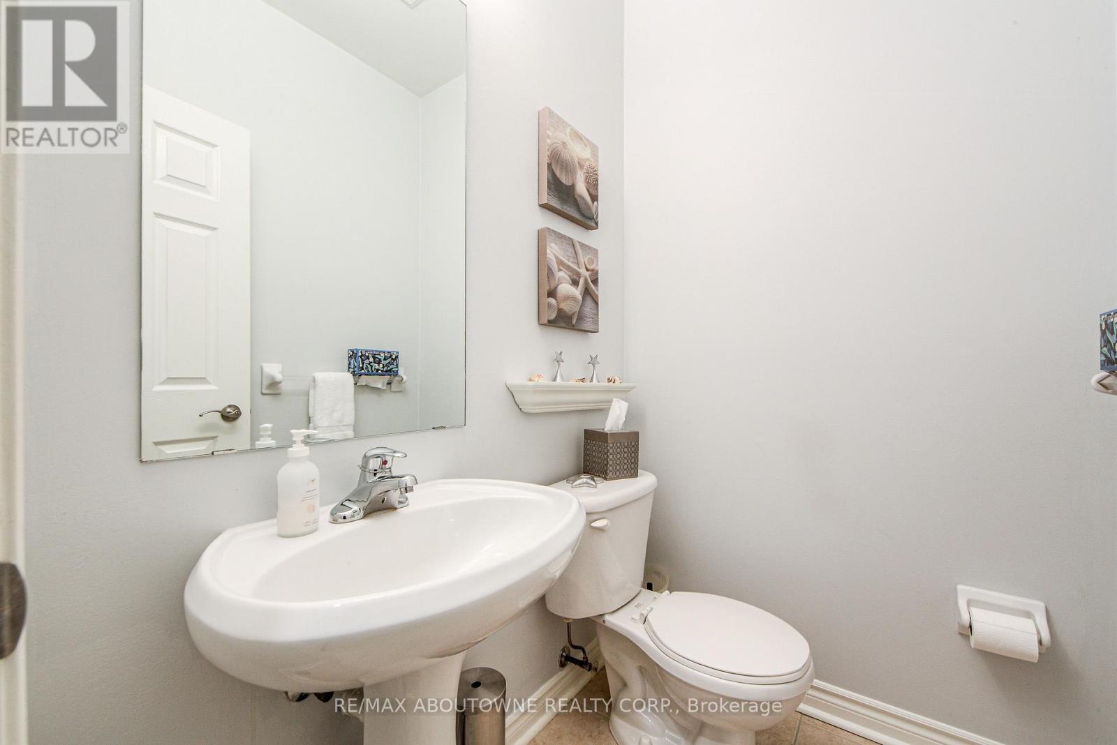 21 - 300 Ravineview Way, Oakville, Ontario  L6H 7J1 - Photo 4 - W12168614