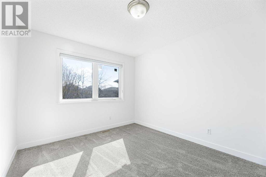 53 Strathlea Grove Sw, Calgary, Alberta  T3H 5C5 - Photo 31 - A2213324
