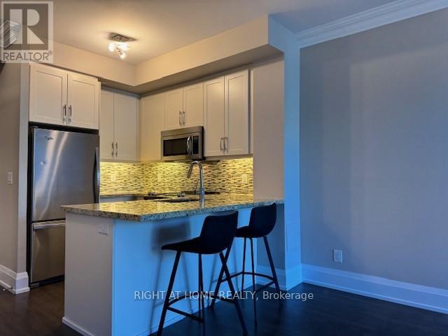 320 - 1 Old Mill Drive, Toronto, Ontario  M6S 0A1 - Photo 8 - W12169987