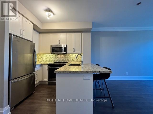 320 - 1 Old Mill Drive, Toronto, Ontario  M6S 0A1 - Photo 9 - W12169987