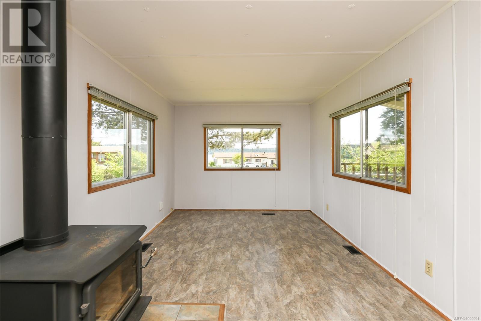 7439 Yake Rd, Fanny Bay, British Columbia  V0R 1W0 - Photo 12 - 1000991