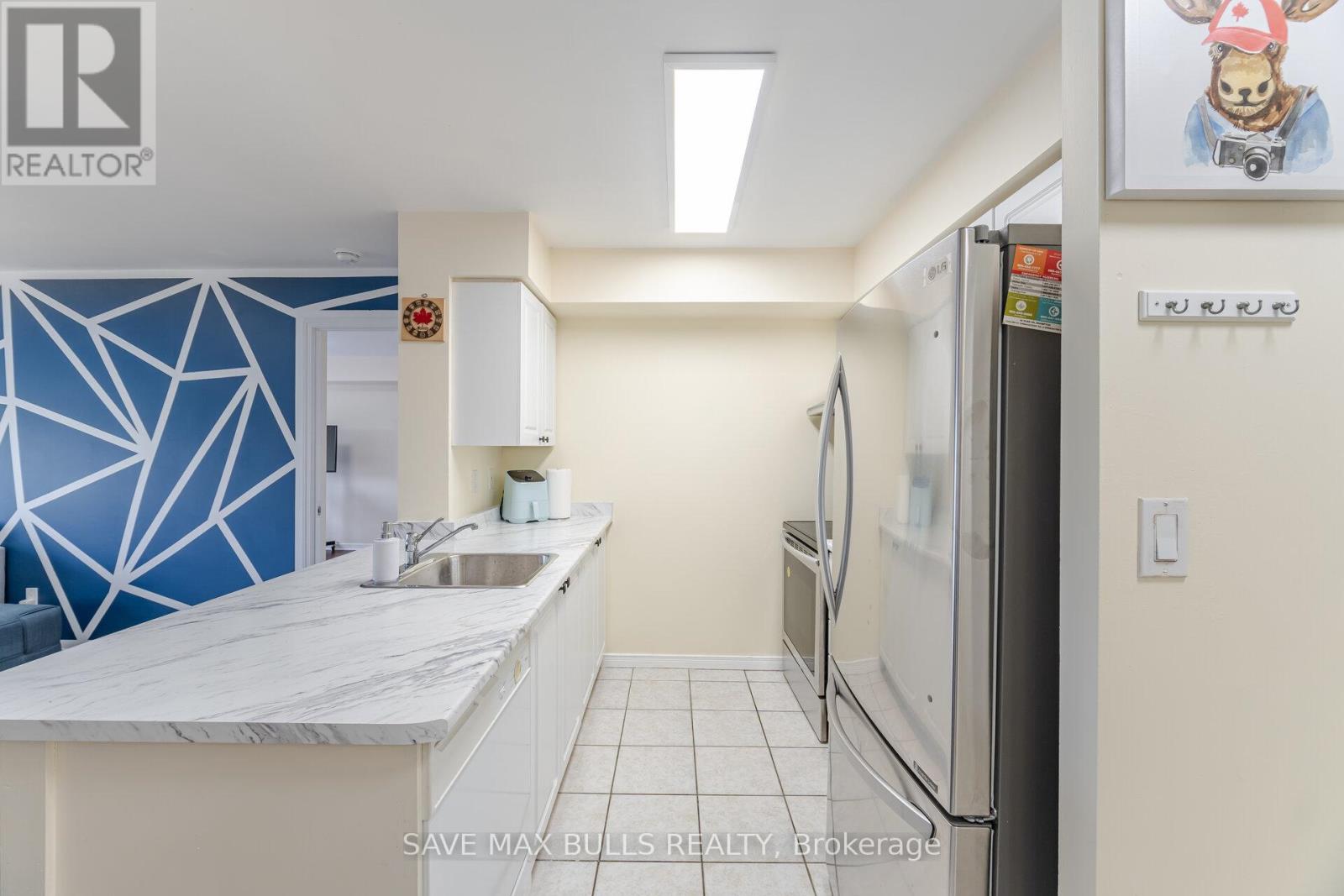 303 - 300 Ray Lawson Boulevard, Brampton, Ontario  L6Y 5H5 - Photo 5 - W12170254