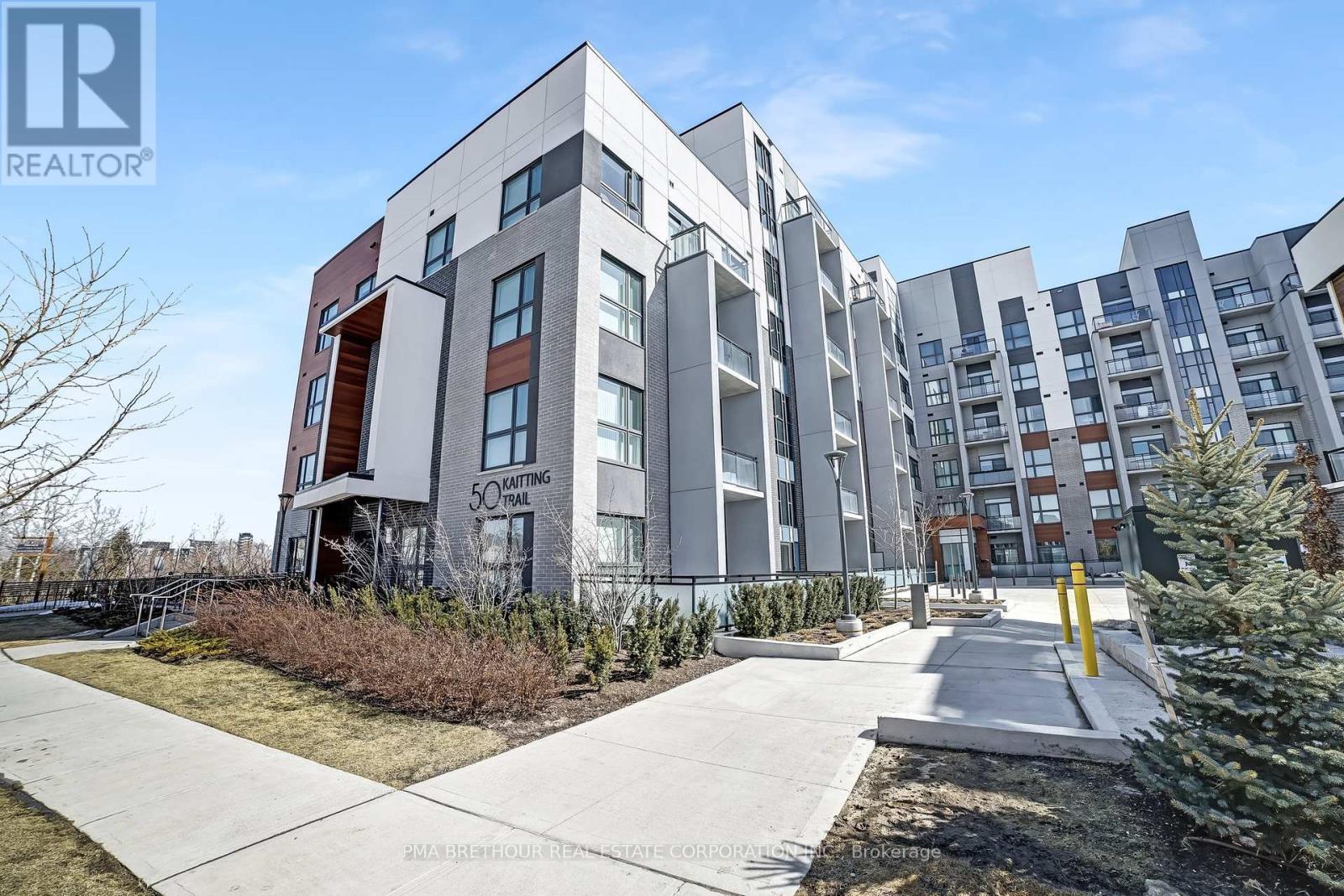 101 - 50 Kaitting Trail, Oakville, Ontario  L6M 5N3 - Photo 4 - W12170687