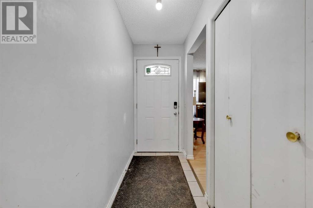 8, 75 Templemont Way Ne, Calgary, Alberta  T1Y 5K8 - Photo 3 - A2212456