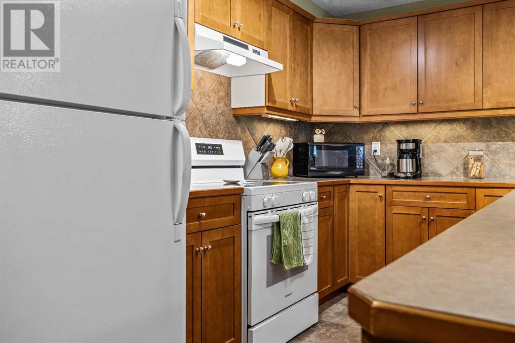 215, 150 Crossbow Place, Canmore, Alberta  T1W 3H5 - Photo 11 - A2224018