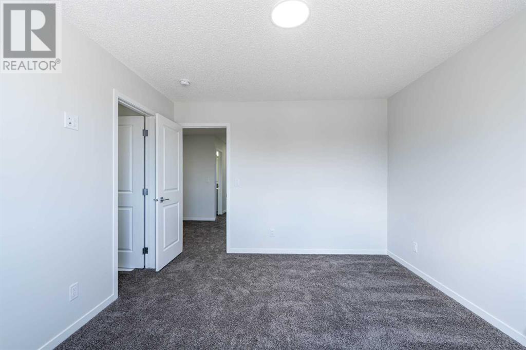 1017 Dawson Dock Avenue, Chestermere, Alberta  T1X 2X7 - Photo 17 - A2213836