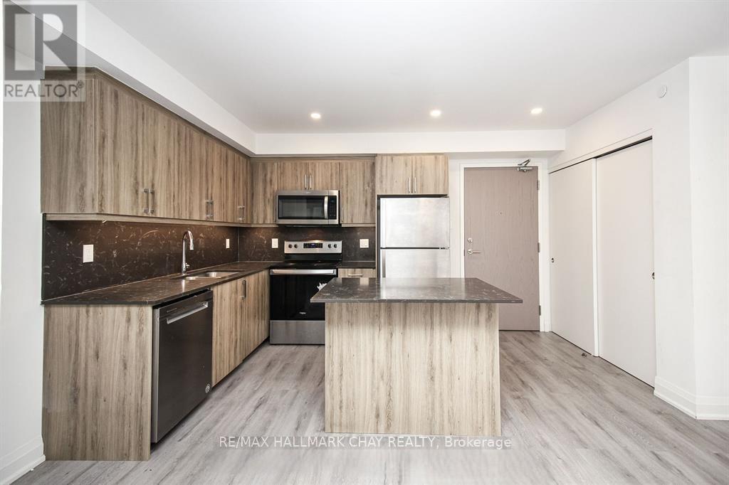 308 - 58 Lakeside Terrace, Barrie, Ontario  L4M 0L5 - Photo 2 - S12171334