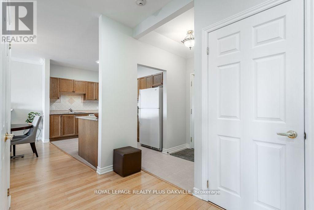403 - 1499 Nottinghill Gate, Oakville, Ontario  L6M 5G1 - Photo 3 - W12164432