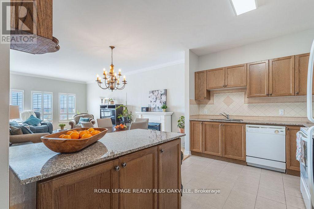 403 - 1499 Nottinghill Gate, Oakville, Ontario  L6M 5G1 - Photo 4 - W12164432