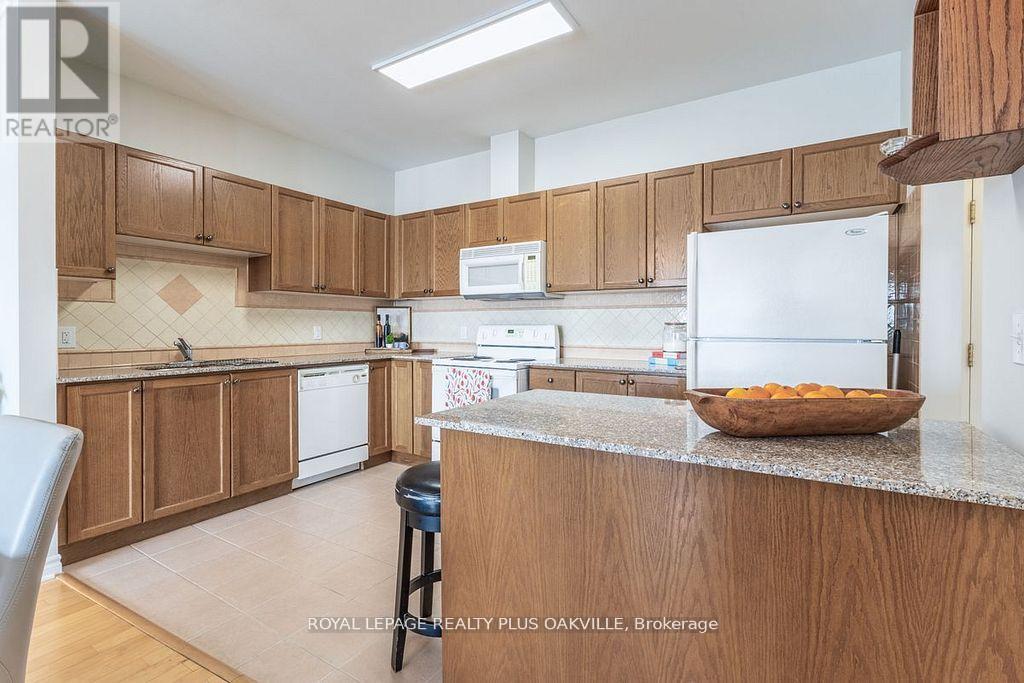 403 - 1499 Nottinghill Gate, Oakville, Ontario  L6M 5G1 - Photo 5 - W12164432