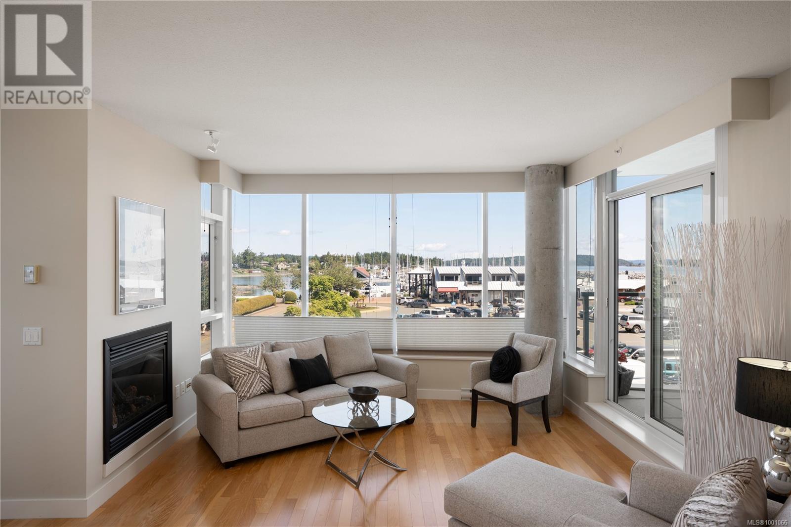 201 9809 Seaport Pl, Sidney, British Columbia  V8L 0A5 - Photo 2 - 1001066