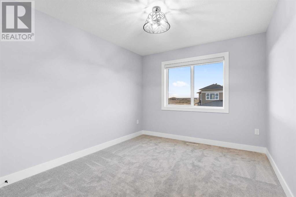 700 Mandalay Link, Carstairs, Alberta  T0M 0N0 - Photo 6 - A2198348