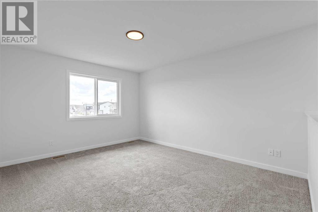 34 Ellen Bay, Crossfield, Alberta  T0M 0S0 - Photo 23 - A2206861
