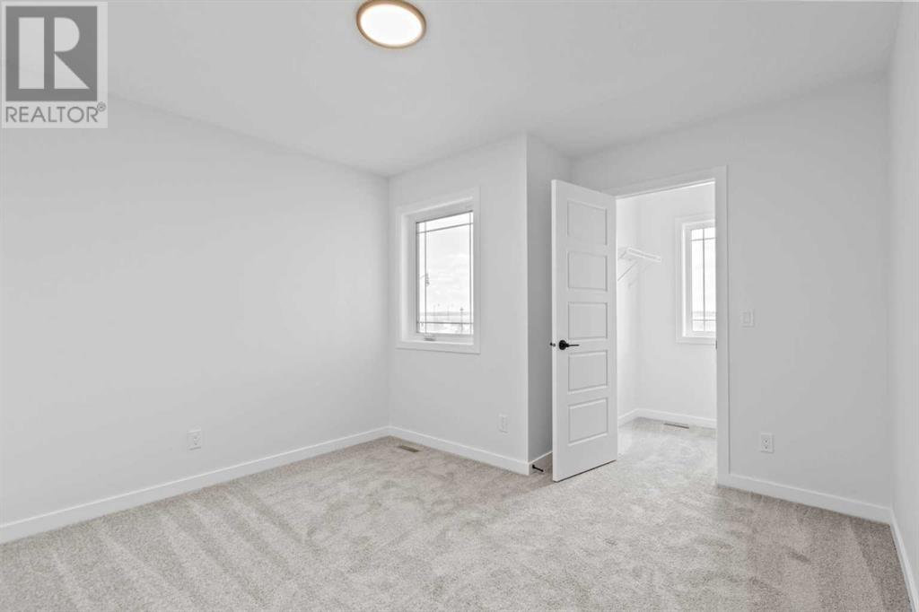 34 Ellen Bay, Crossfield, Alberta  T0M 0S0 - Photo 33 - A2206861