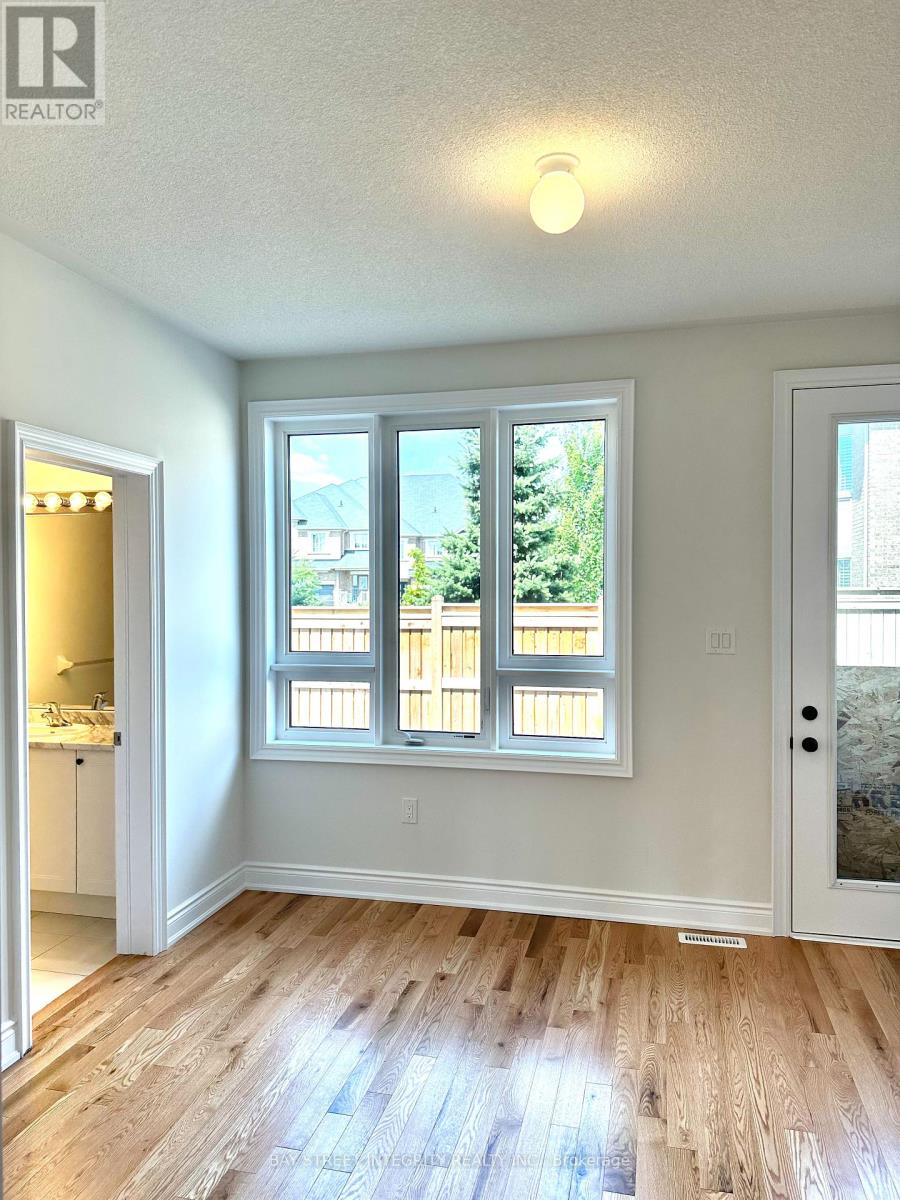 259 Tennant Circle, Vaughan, Ontario  L4H 5L4 - Photo 4 - N12172160